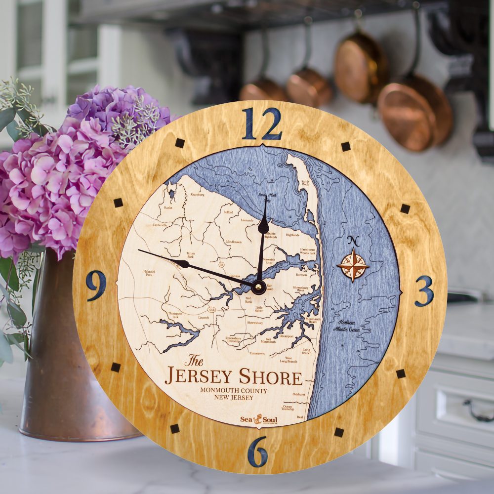 Jersey Shore Nautical Clock Honey Accent with Deep Blue Water Sitting on Countertop with Flowers