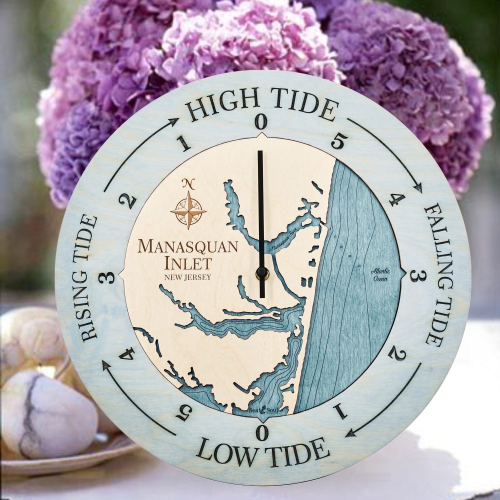Manasquan Inlet Tide Clock Bleach Blue Accent with Blue Green Water Sitting on Table with Flowers