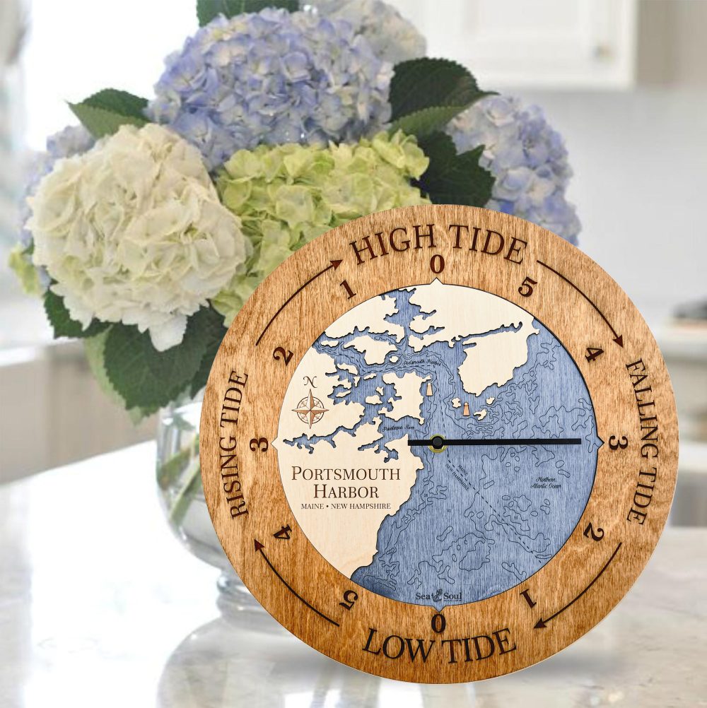 Portsmouth Harbor Tide Clock Americana Accent with Deep Blue Water Sitting on Countertop with Flowers