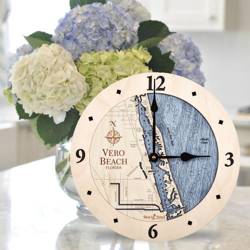 Vero Beach Nautical Clock Birch Accent with Deep Blue Water Sitting on Counter with Flowers