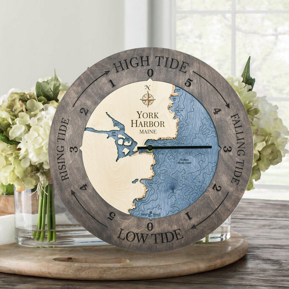 York Harbor Tide Clock Driftwood Accent with Deep Blue Water Sitting on Table with Flowers