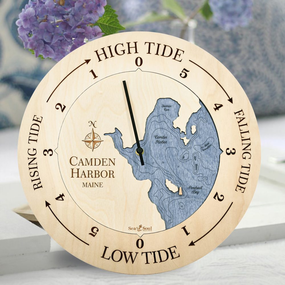 Camden Harbor Tide Clock Birch Accent with Deep Blue Water Sitting on Table with Flowers