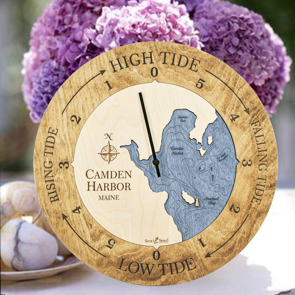 Camden Harbor Tide Clock Honey Accent with Deep Blue Water Sitting on Table with Flowers