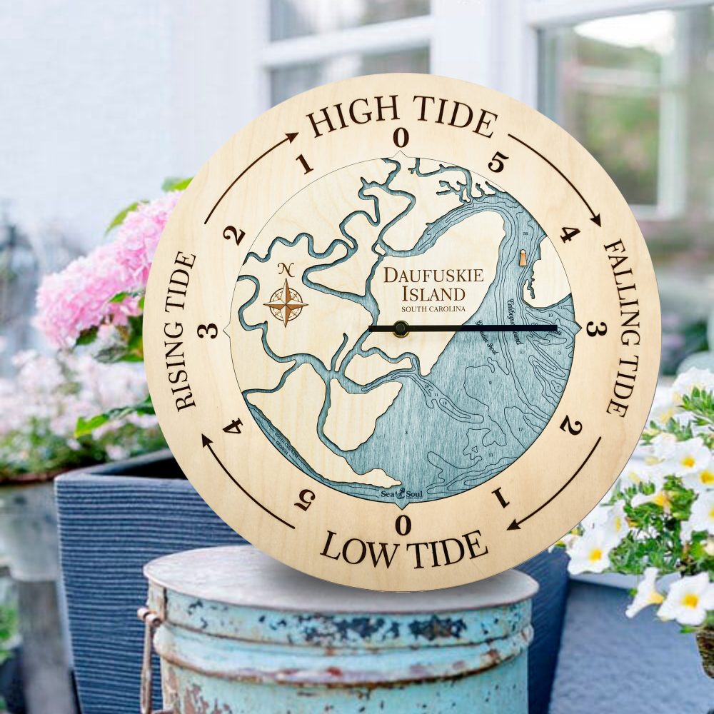 Daufuskie Island Tide Clock Birch Accent with Blue Green Water Sitting on Bucket Outside by Flowers