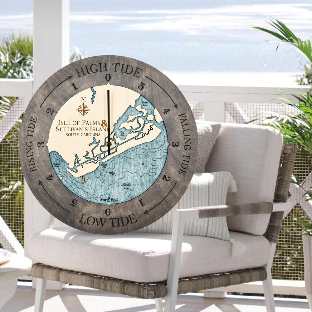 Isle of Palms Tide Clock Driftwood Accent with Blue Green Water Sitting on Outdoor Chair by Waterfront
