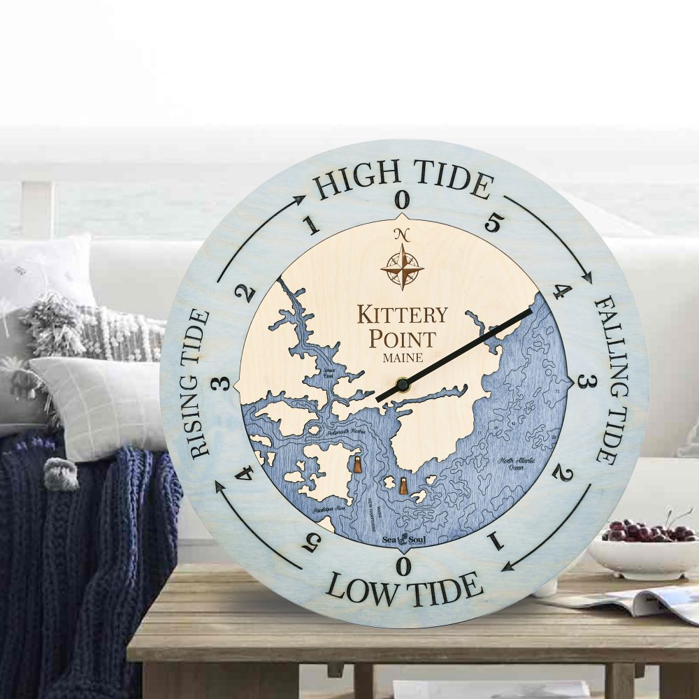 Kittery Point Tide Clock Bleach Blue Accent with Deep Blue Water Sitting on Outdoor Table by Waterfront