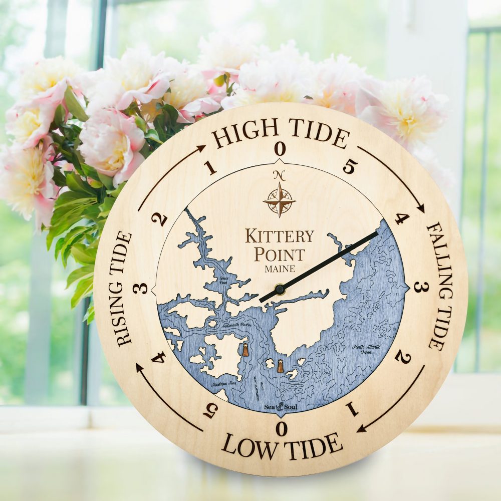 Kittery Point Tide Clock Birch Accent with Deep Blue Water Sitting on Windowsill with Flowers
