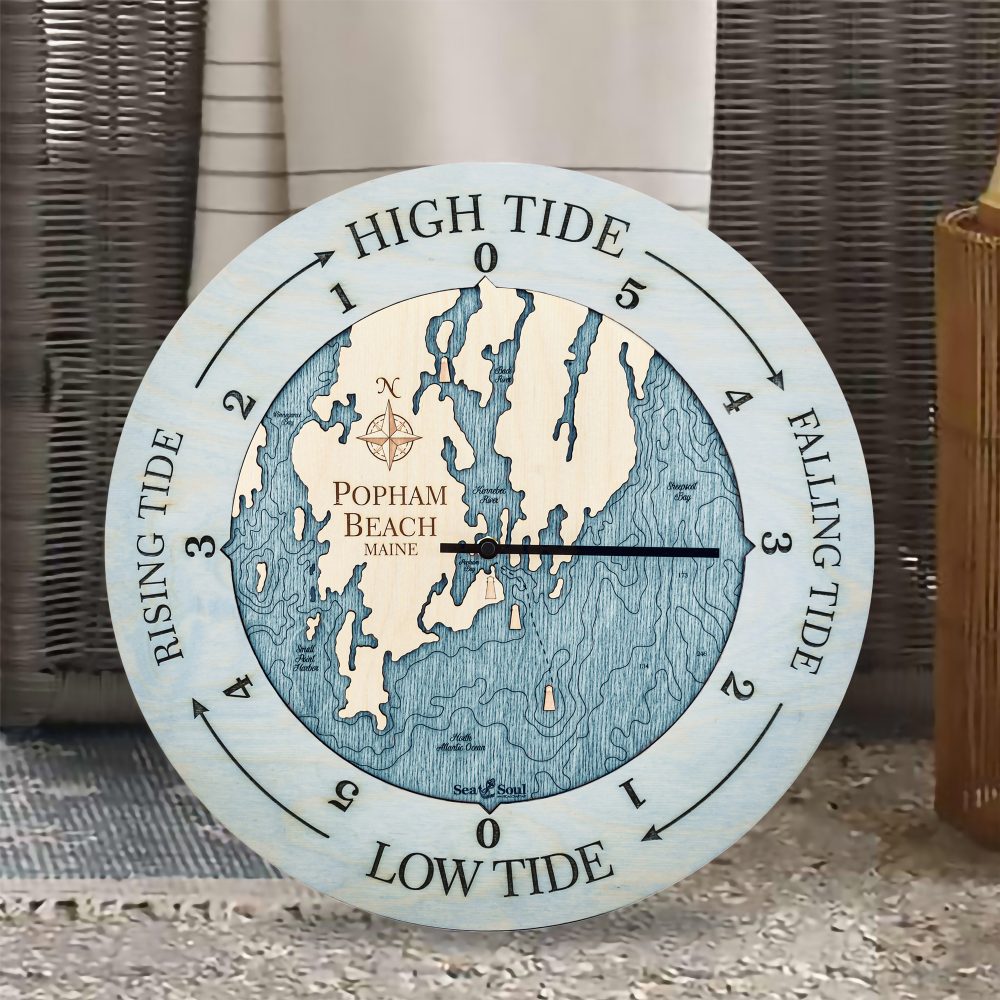 Popham Beach Tide Clock Bleach Blue Accent with Blue Green Water Sitting on Ground by Outdoor Couch