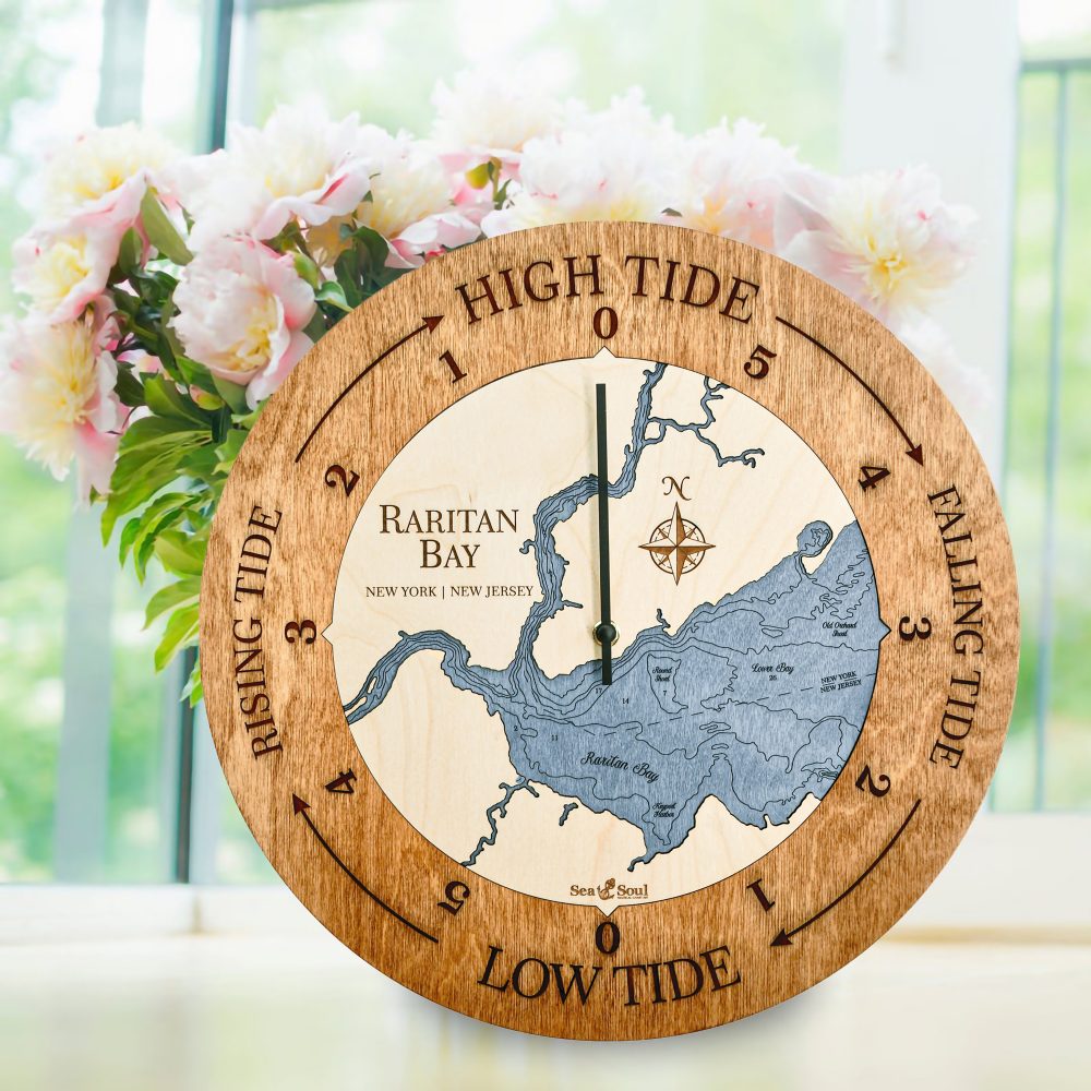 Raritan Bay Tide Clock Americana Accent with Deep Blue Water Sitting on Windowsill with Flowers