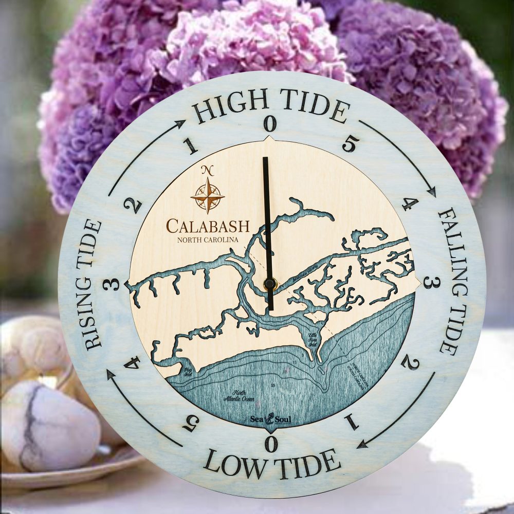 Calabash Tide Clock Bleach Blue Accent with Blue Green Water Sitting on Table with Flowers