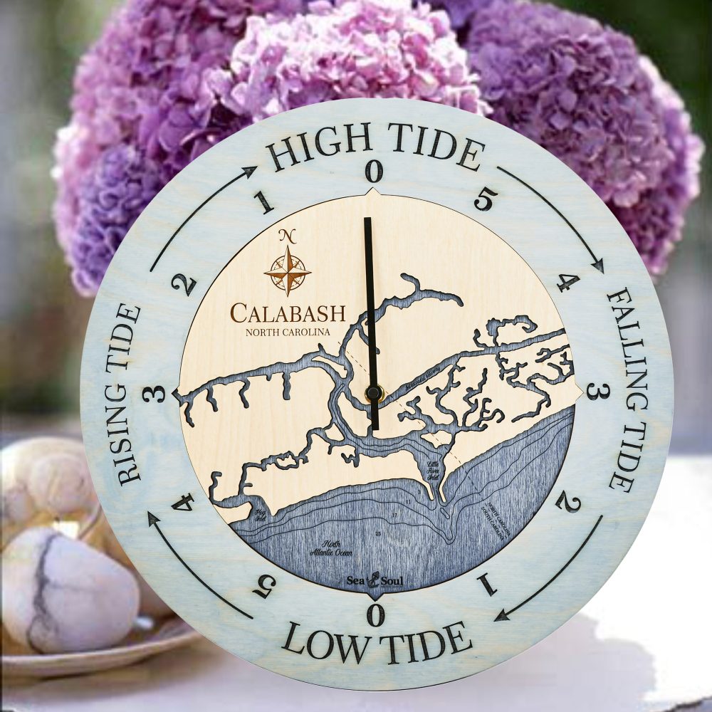 Calabash Tide Clock Bleach Blue Accent with Deep Blue Water Sitting on Table with Flowers