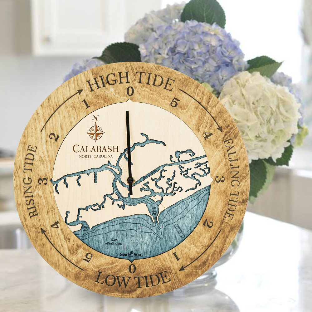 Calabash Tide Clock Honey Accent with Blue Green Water Sitting on Countertop with Flowers