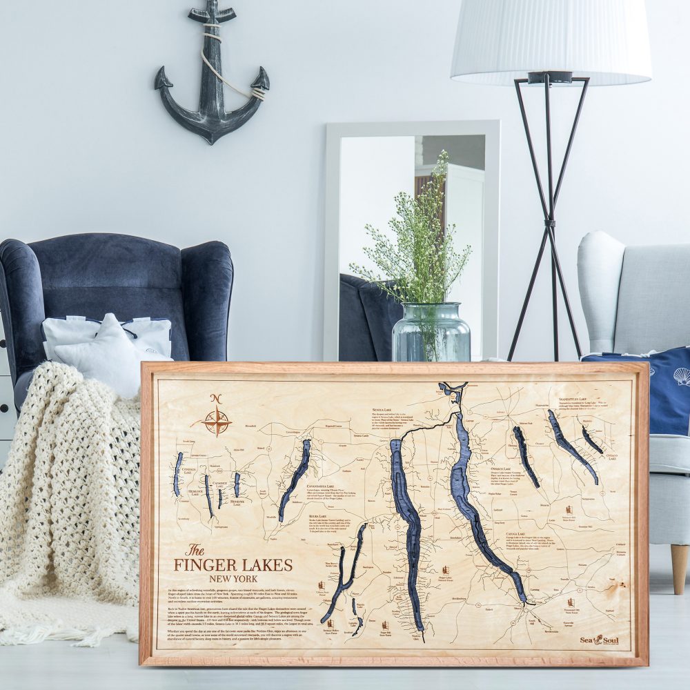 Finger Lakes Nautical Map Wall Art Oak Accent with Deep Blue Water Sitting in Living Room by Armchairs