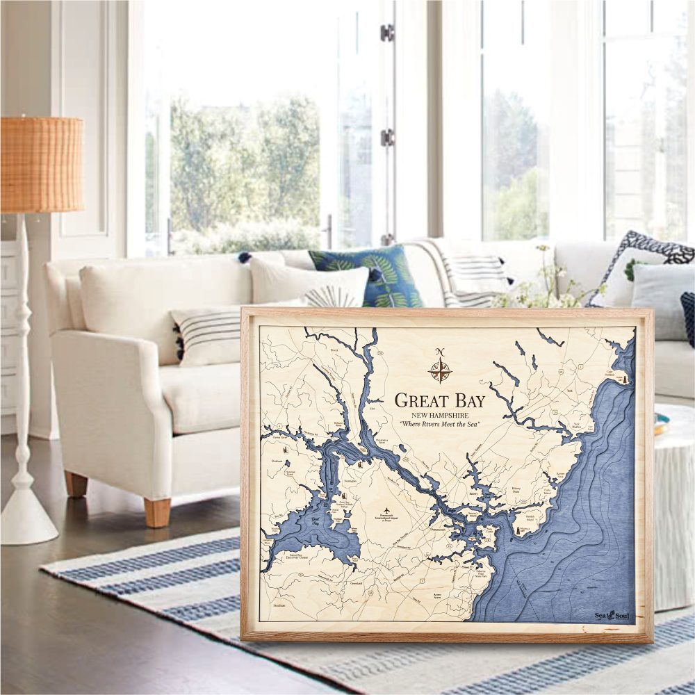 Great Bay Nautical Map Wall Art Oak Accent with Deep Blue Water Sitting in Living Room by Couch