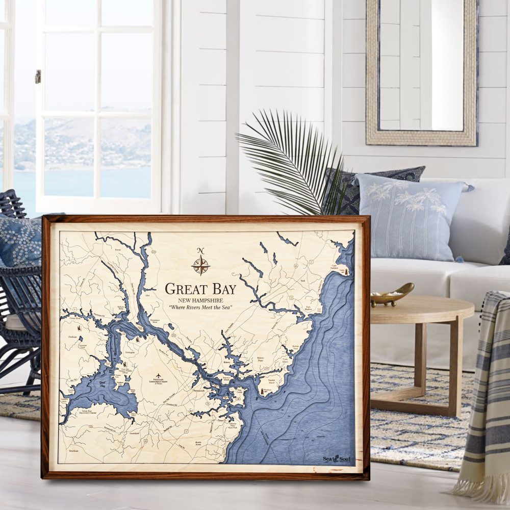 Great Bay Nautical Map Wall Art Walnut Accent with Deep Blue Water Sitting in Living Room by Coffee Table and Chair