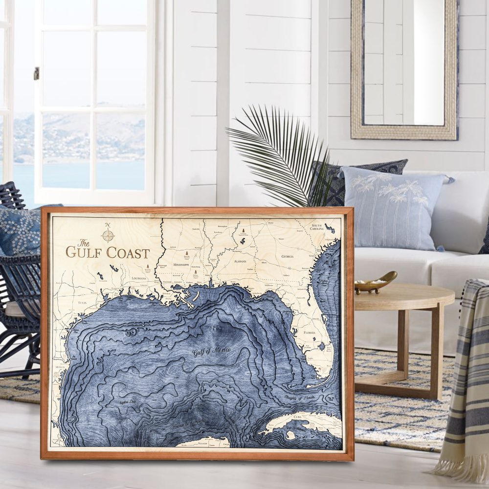 Gulf Coast Nautical Map Wall Art Cherry Accent with Deep Blue Water Sitting in Living Room by Coffee Table and Chair