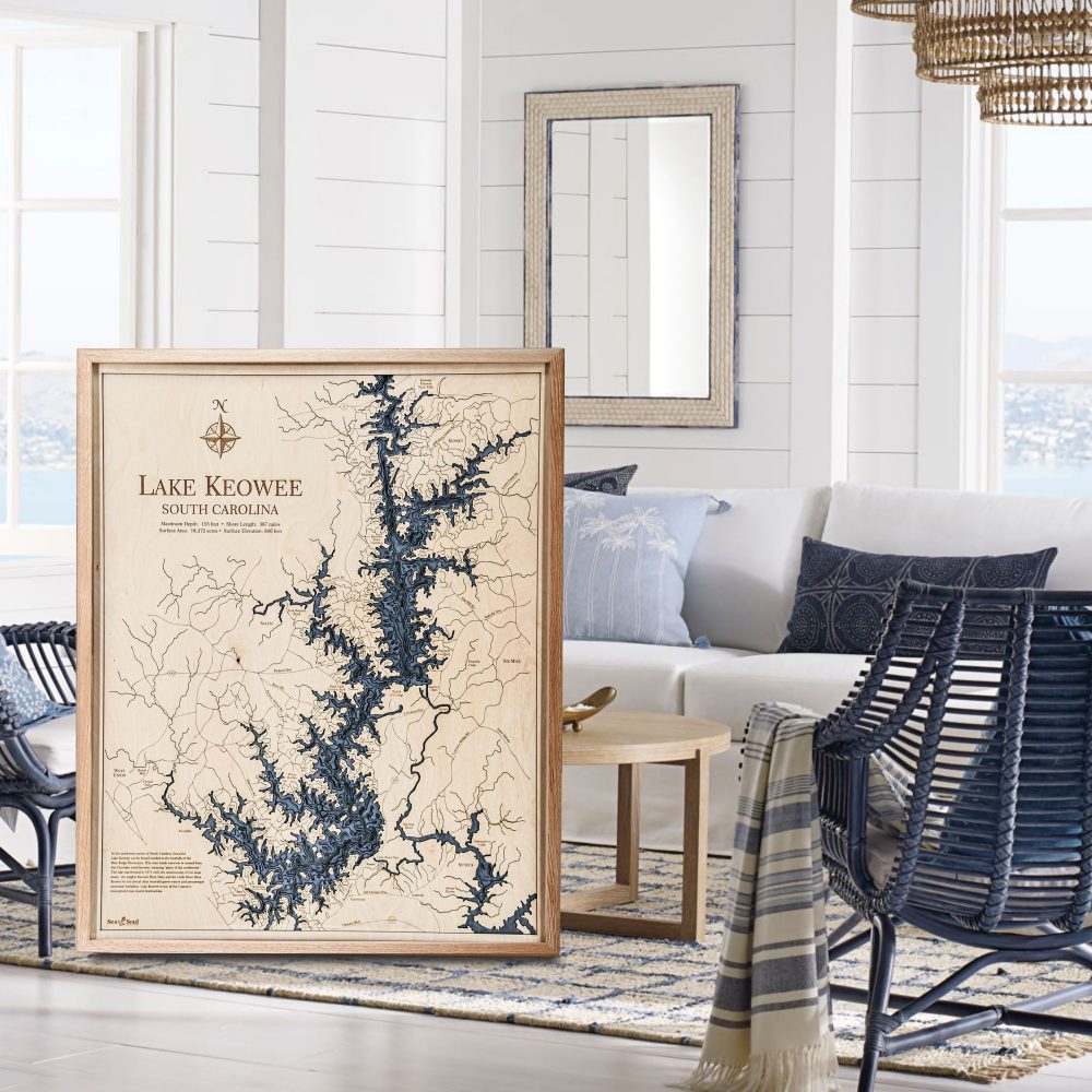 Lake Keowee Nautical Map Wall Art Oak Accent with Deep Blue Water Sitting in Living Room by Coffee Table and Chair