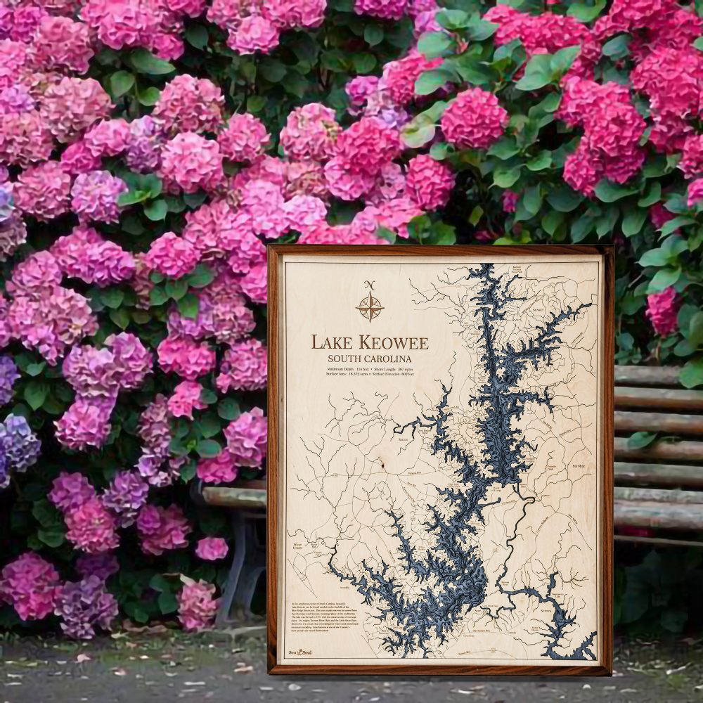 Lake Keowee Nautical Map Wall Art Walnut Accent with Deep Blue Water Sitting Outside by Bench and Flowers