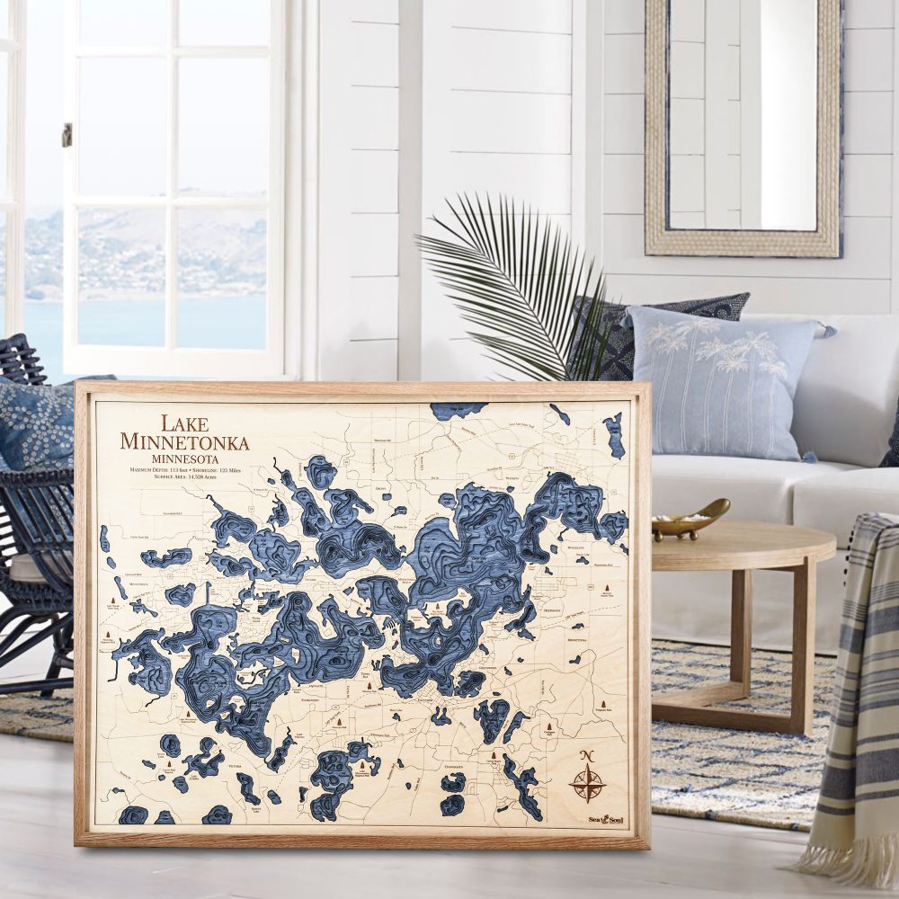 Lake Minnetonka Nautical Map Wall Art Oak Accent with Deep Blue Water Sitting in Living Room by Coffee Table