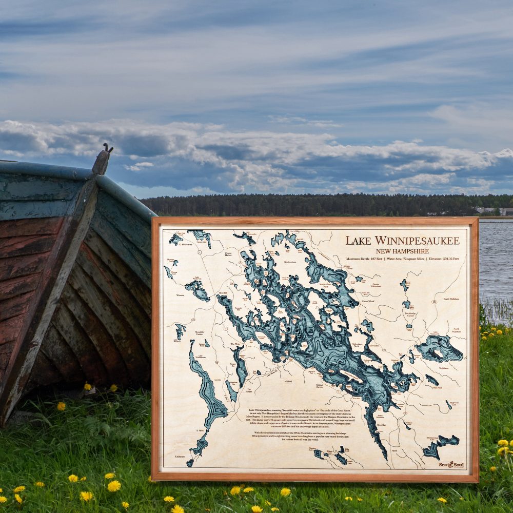 Lake Winnipesaukee Nautical Map Wall Art Cherry Accent with Blue Green Water Sitting Outdoors by Boat and Waterfront
