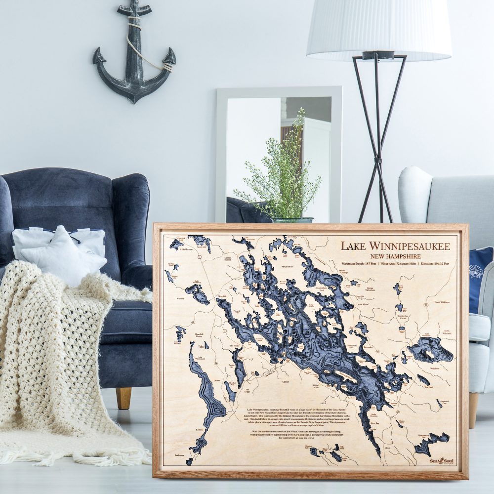 Lake Winnipesaukee Nautical Map Wall Art Oak Accent with Deep Blue Water Sitting in Living Room by Armchairs