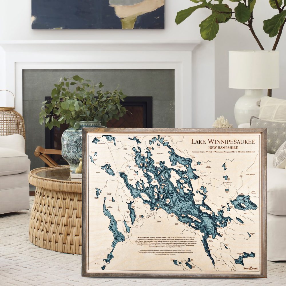 Lake Winnipesaukee Nautical Map Wall Art Rustic Pine Accent with Blue Green Water Sitting in Living Room by Coffee Table and Couch
