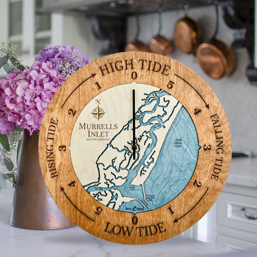 Murrels Inlet Tide Clock Americana Accent with Blue Green Water Sitting on Countertop with Flowers