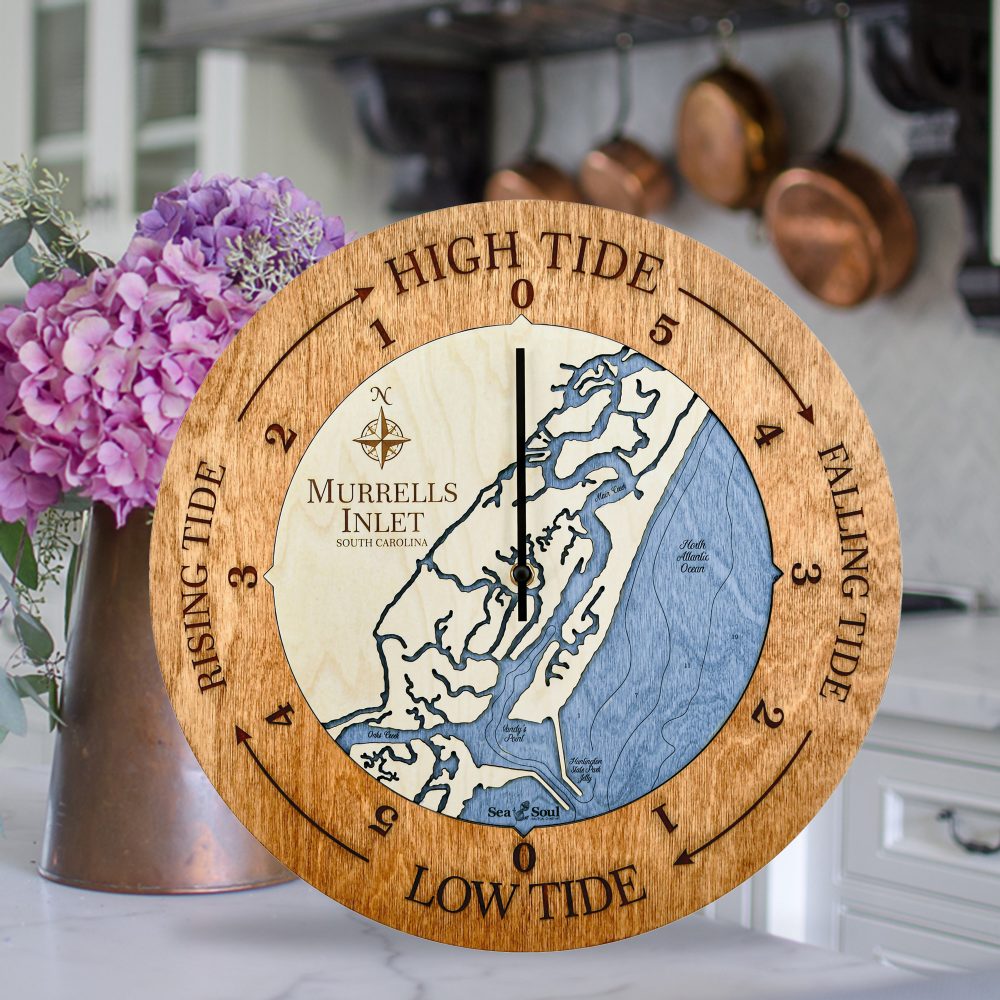 Murrels Inlet Tide Clock Americana Accent with Deep Blue Water Sitting on Countertop with Flowers