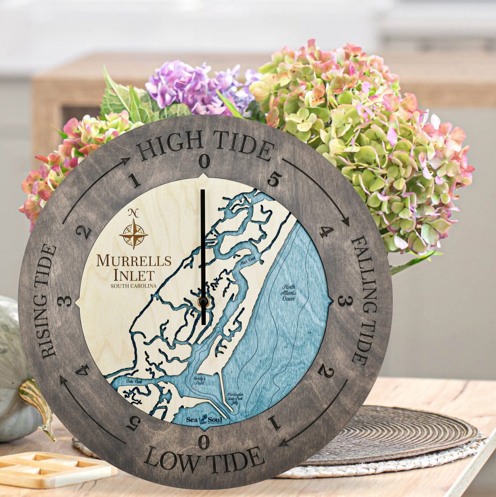 Murrels Inlet Tide Clock Driftwood Accent with Blue Green Water Sitting on Countertop with Flowers