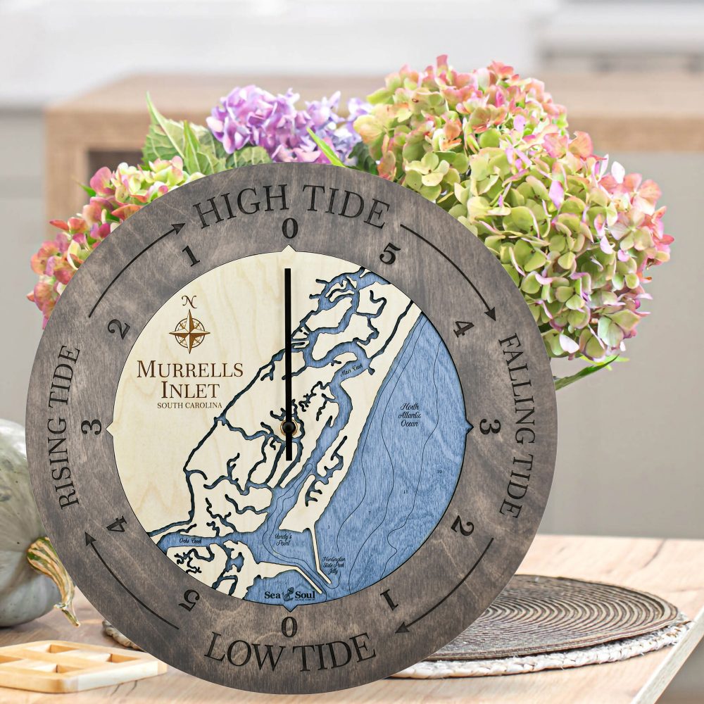 Murrels Inlet Tide Clock Driftwood Accent with Deep Blue Water Sitting on Countertop with Flowers