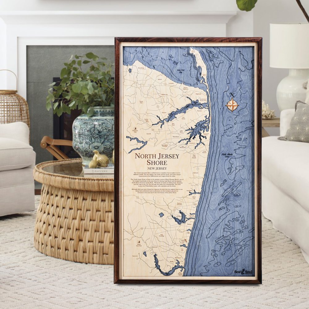 North Jersey Nautical Map Wall Art Walnut Accent with Deep Blue Water Sitting on Living Room Floor by Coffee Table