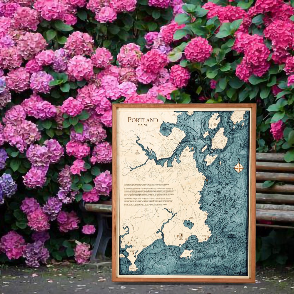 Portland Nautical Map Wall Art Cherry Accent with Blue Green Water Sitting Outside by Bench and Flowers