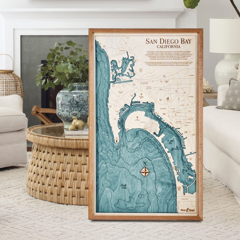 San Diego Nautical Map Wall Art Cherry Accent with Blue Green Water Sitting on Ground by Coffee Table