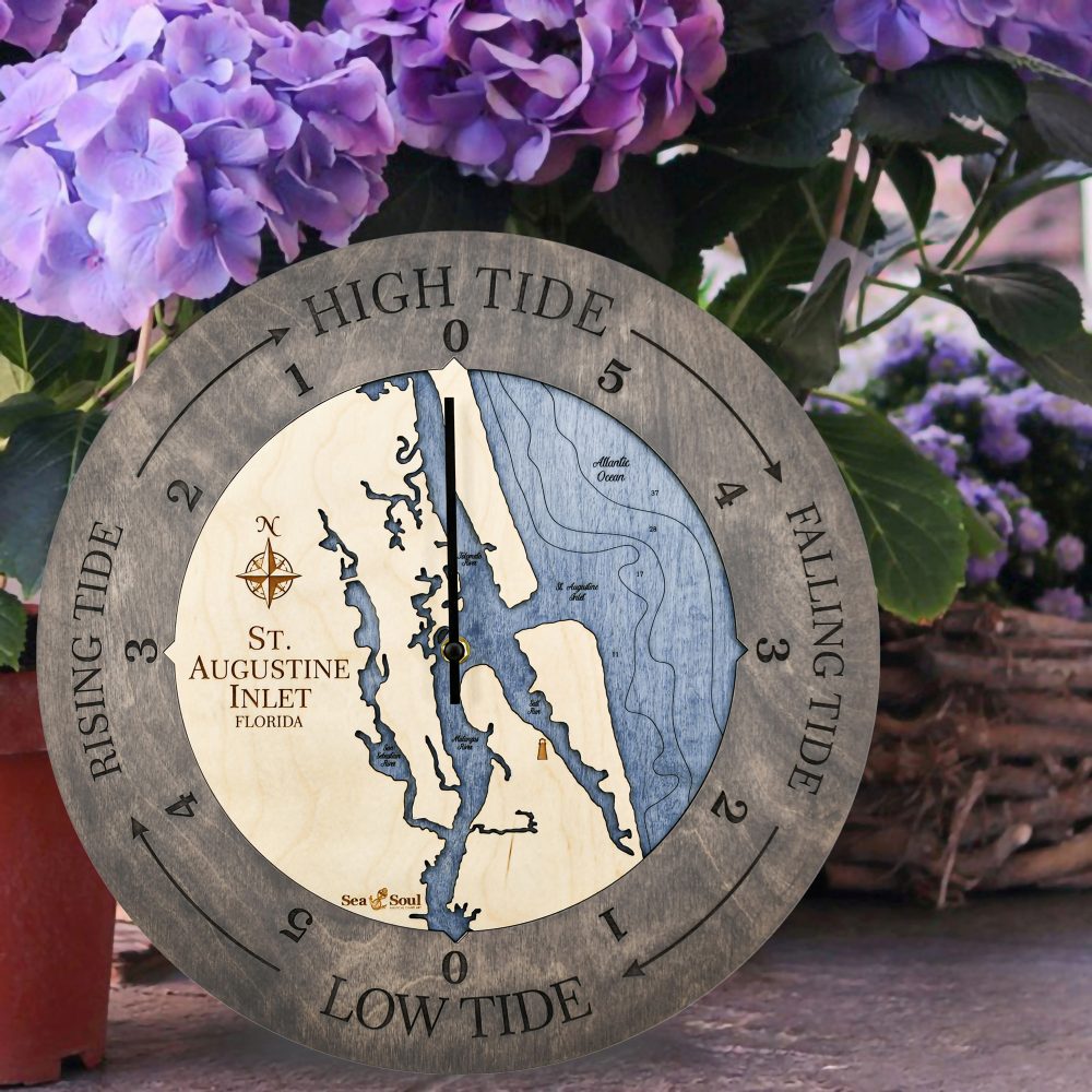 St. Augustine Tide Clock Driftwood Accent with Deep Blue Water Sitting on Ground by Flower Pot
