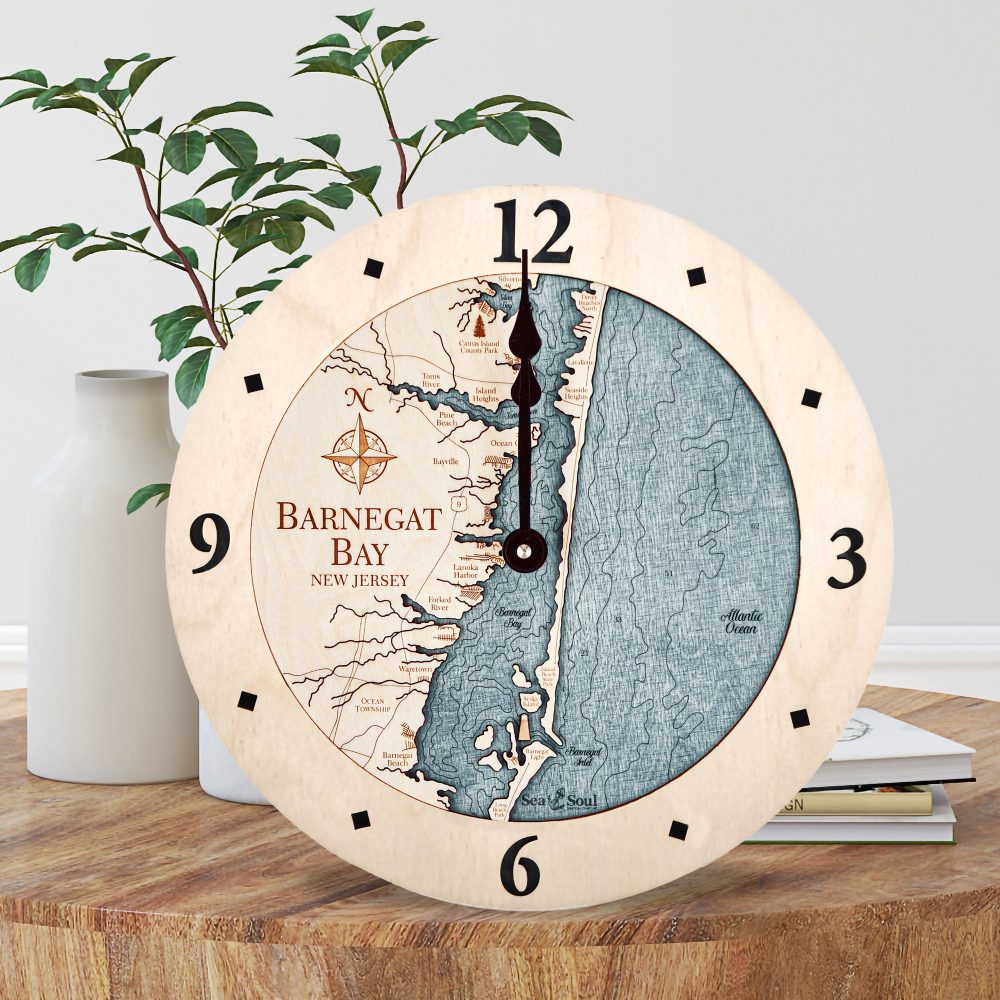 Barnegat Bay Nautical Map Wall Art Birch Accent with Blue Green Water Sitting on Coffee Table by Books and Vases