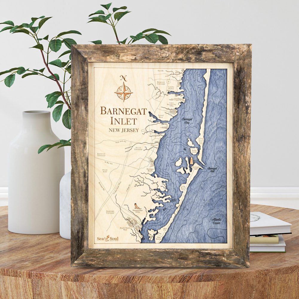 Barnegat Inlet Wall Art Rustic Pine Accent with Deep Blue Water Sitting on Coffee Table by Books and Vases