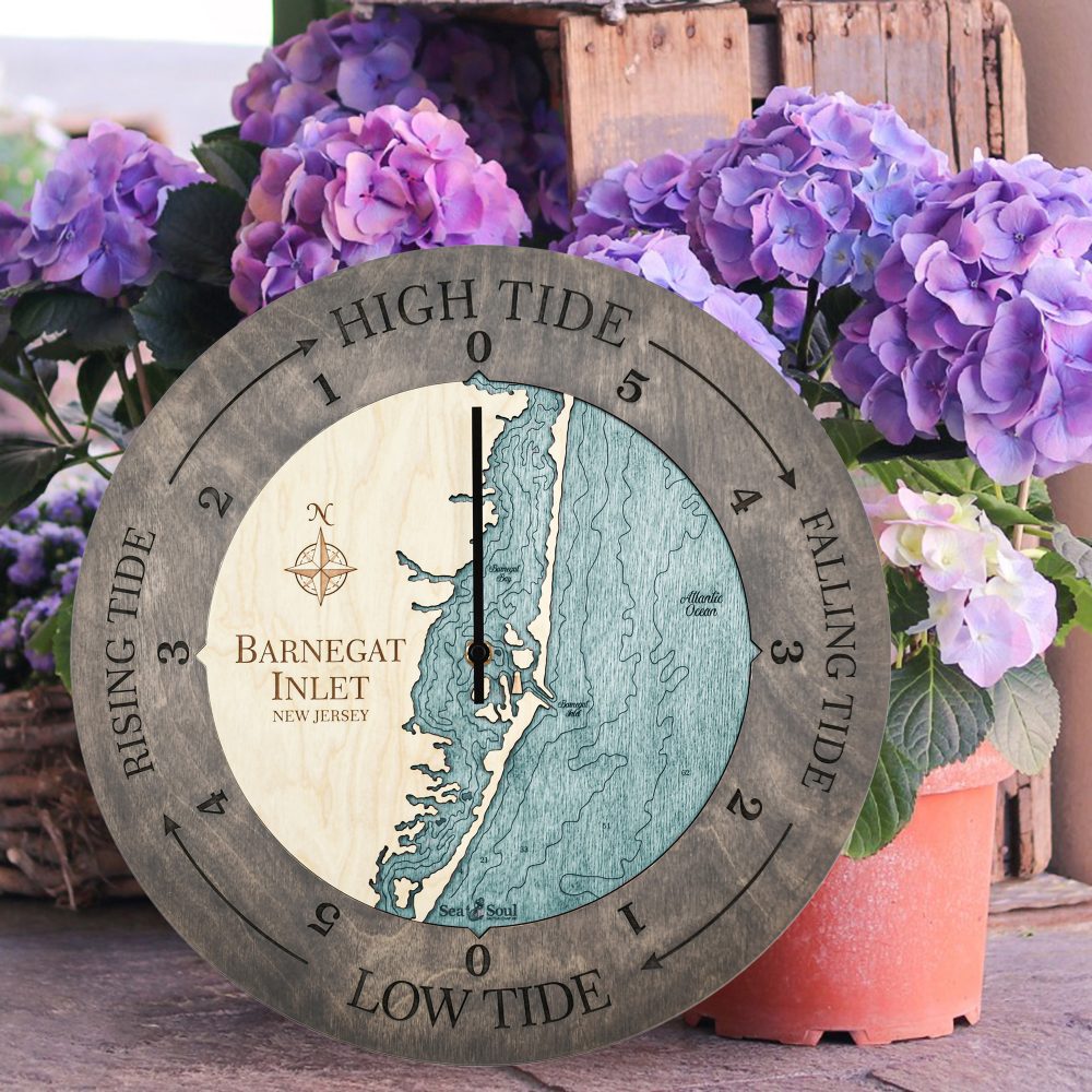 Barnegat Inlet Tide Clock Driftwood Accent with Blue Green Water Sitting on Ground by Flower Pots