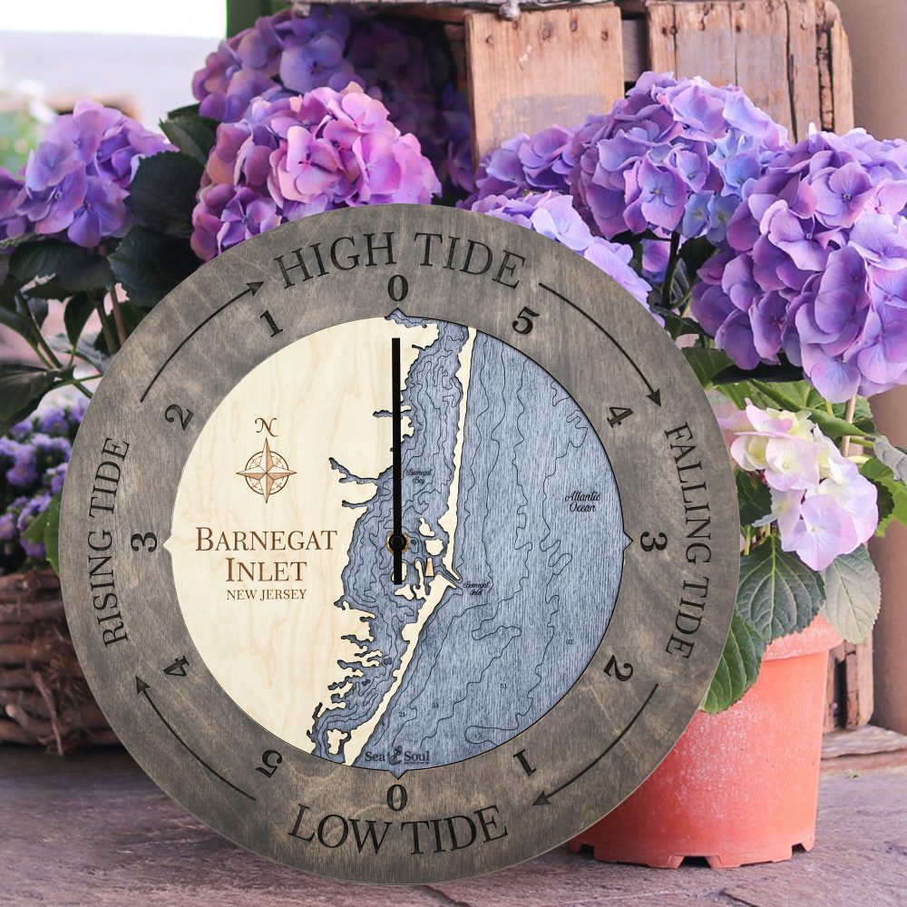 Barnegat Inlet Tide Clock Driftwood Accent with Deep Blue Water Sitting on Ground by Flower Pots