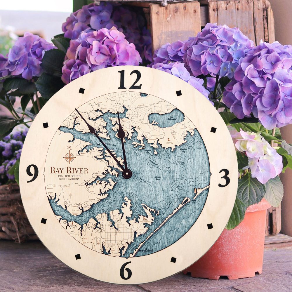 Bay River Nautical Wall Clock Birch Accent with Blue Green Water Sitting on Ground by Flower Pots