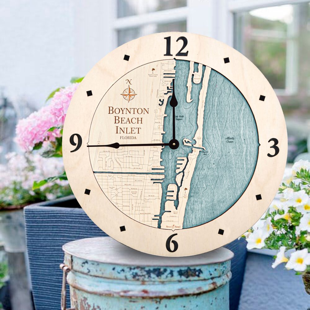 Boynton Beach Nautical Wall Clock Birch Accent with Blue Green Water Sitting on Bucket Outdoors by Flowers