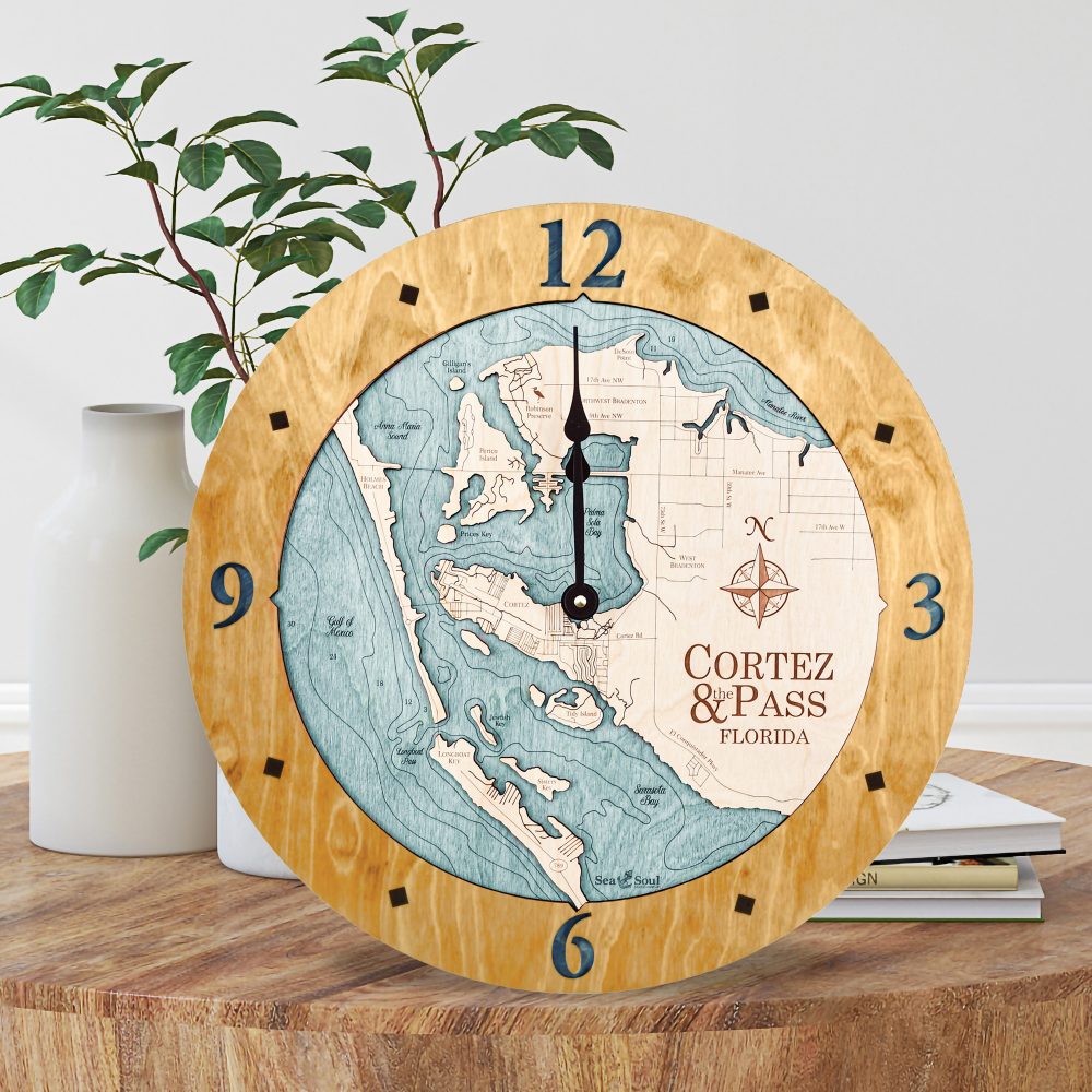 Cortez and Pass Nautical Map Wall Clock Honey Accent with Blue Green Water Sitting Coffee Table with Books and Vases