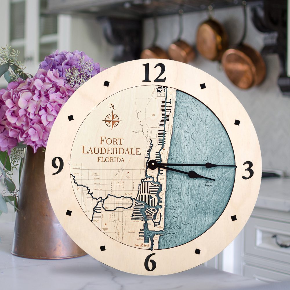 Fort Lauderdale Nautical Map Wall Art Birch Accent with Blue Green Water Sitting on Counter by Flowers