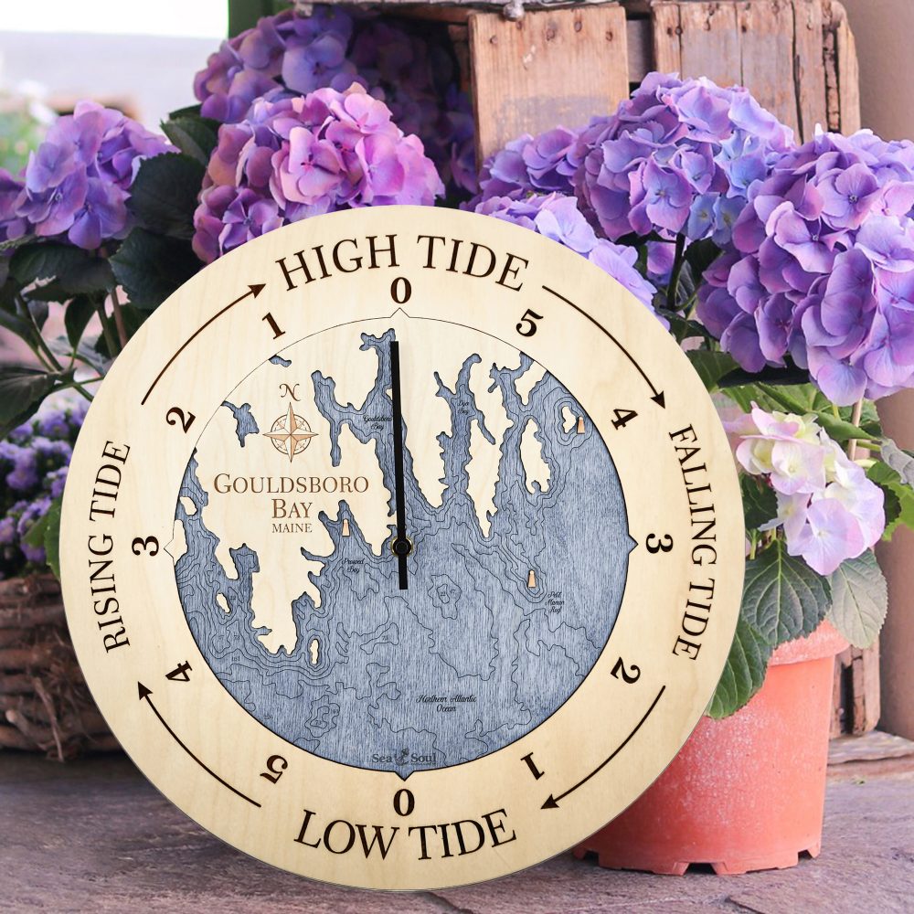 Gouldsboro Bay Tide Clock Birch Accent with Deep Blue Water Sitting on Ground by Flower Pots