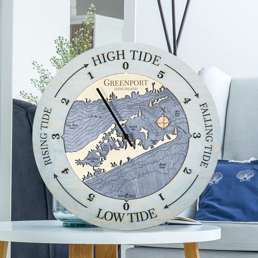 Greenport Tide Clock Bleach Blue Accent with Deep Blue Water Sitting on Coffee Table