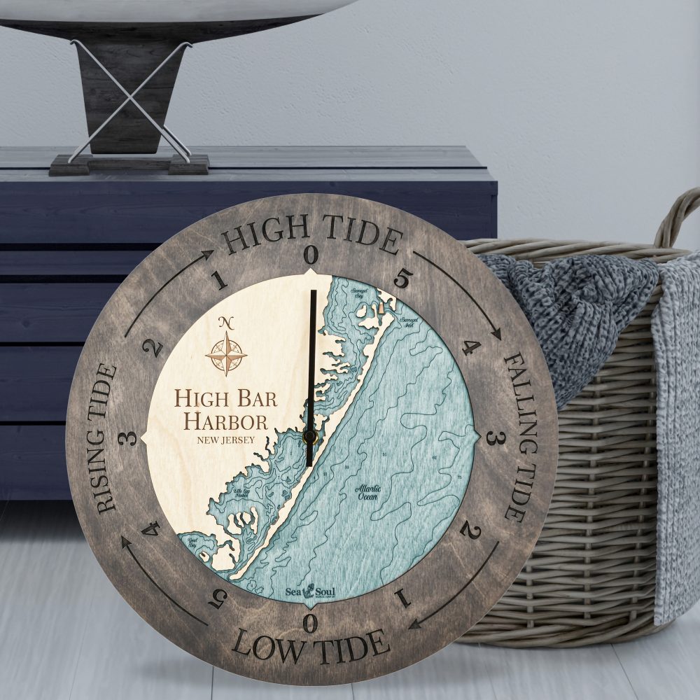 High Bar Harbor Tide Clock Driftwood Accent with Blue Green Water Sitting on Ground by Basket