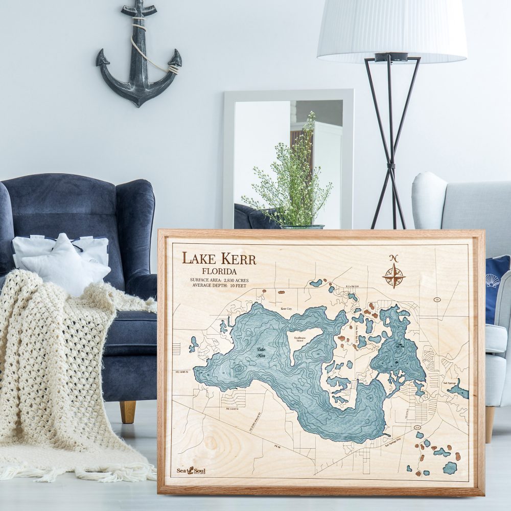 Lake Kerr Nautical Map Wall Art Oak Accent with Blue Green Water Sitting in Living Room by Armchairs