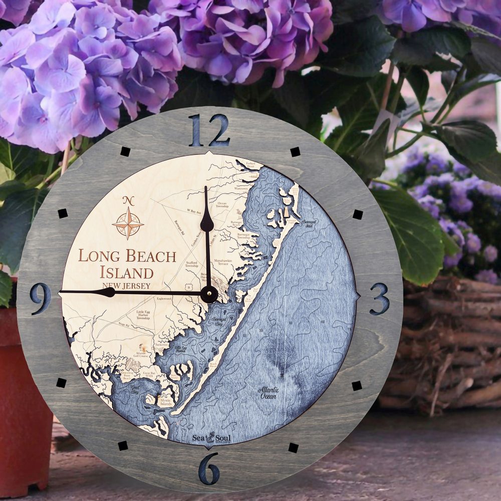 Long Beach Island Nautical Wall Clock Driftwood Accent with Deep Blue Water Sitting on Ground by Flower Pot