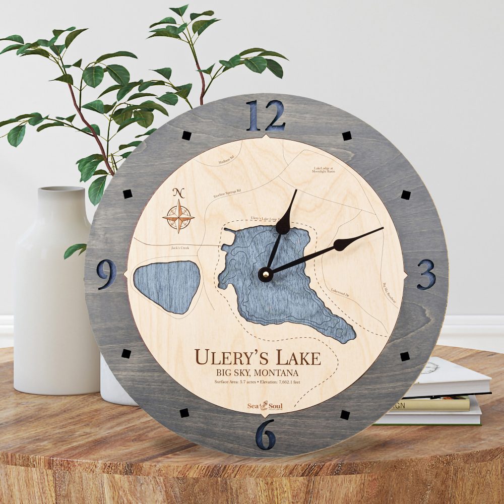 Ulery's Lake Nautical Clock Driftwood Accent with Deep Blue Water Sitting on Coffee Table by Books and Vases