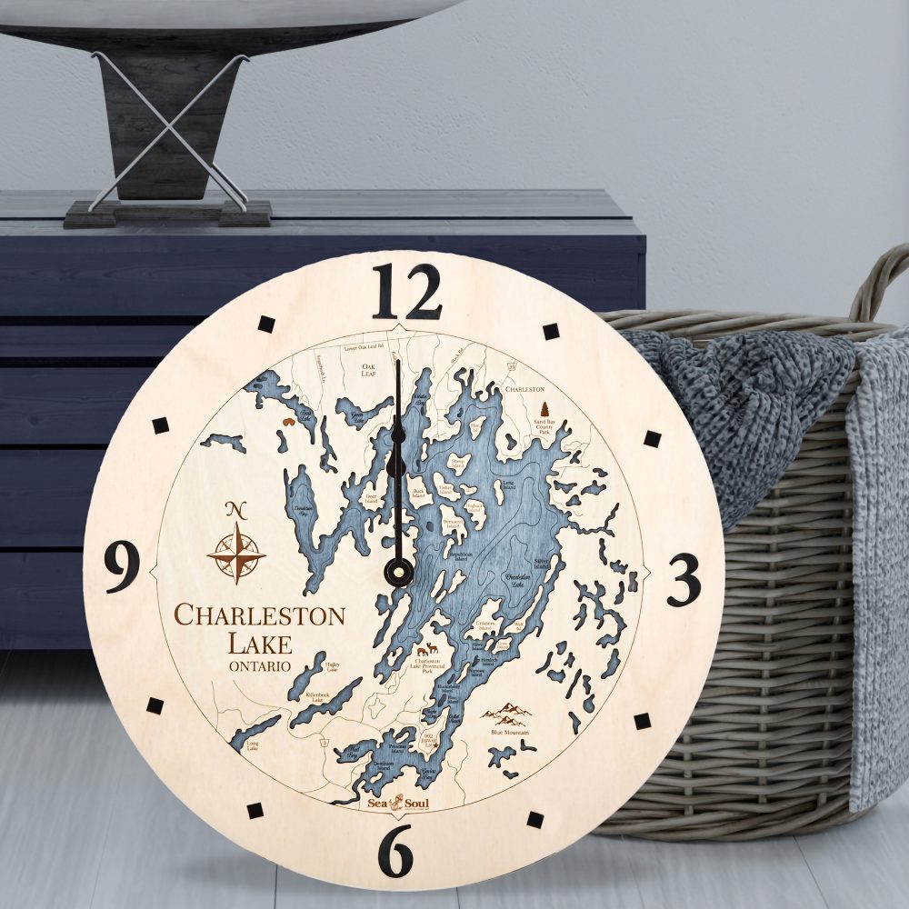 Charleston Lake Nautical Clock Birch Accent with Deep Blue Water Sitting on Ground by Basket