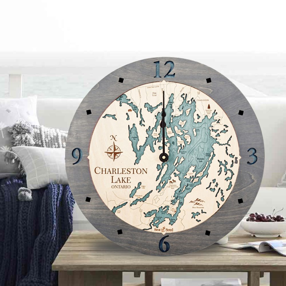 Charleston Lake Nautical Clock Driftwood Accent with Blue Green Water Sitting on Outdoor Table on Porch